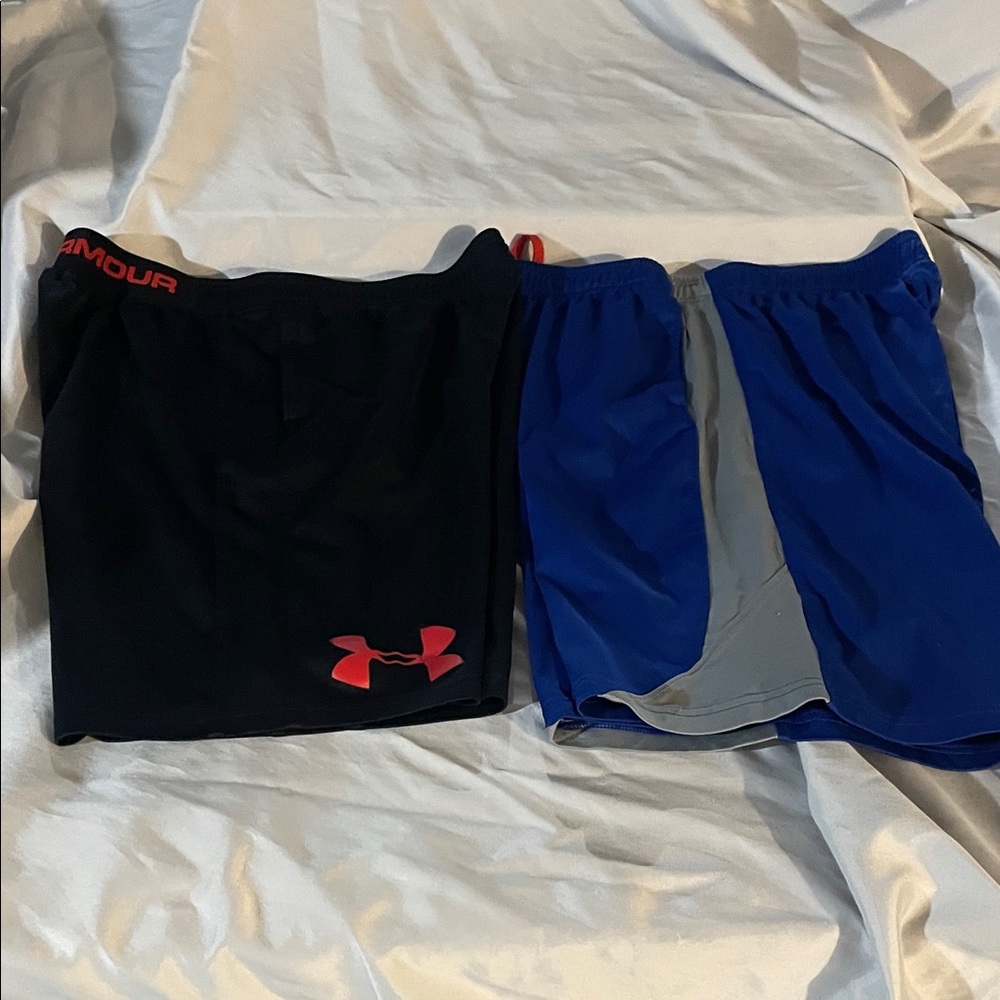 Two pair Under Armour Athletic Shorts,Blue with and Black.